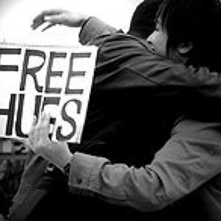 BucketList + Spend A Day In A Big City With A "Free Hugs" Sign